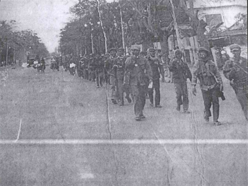 Khmer Rouge forces marching into  Phnom Pen on April 17, 1975 